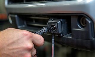 Camera relocation kit being installed on a 4Runner
